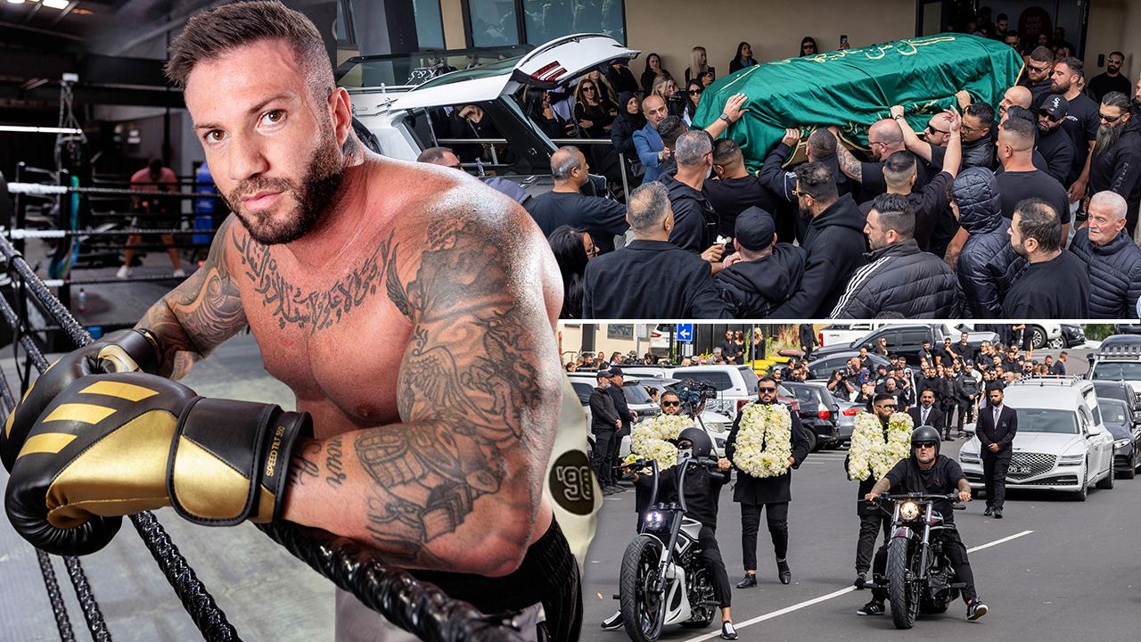 Motorbike procession leads Punisher’s gold coffin to cemetery