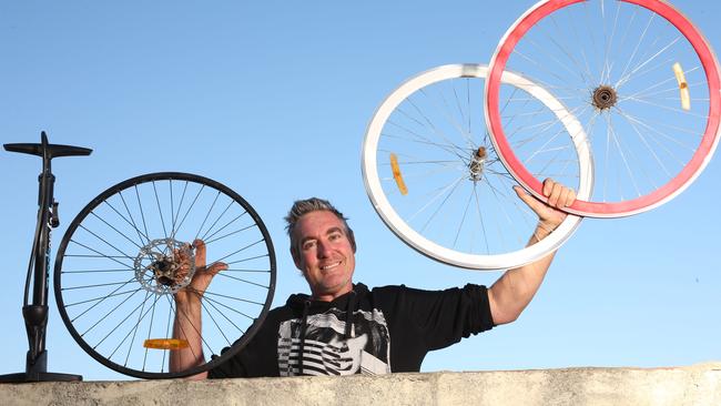 Jeremy Devereux has given away 1000 bikes in 20 months via closed Facebook group Pay It Forward Perth, pictured in his home in Beechboro, Perth. Picture: Supplied.