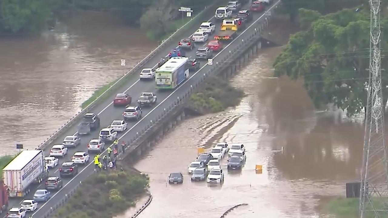 Motorists stranded on Gympie Road in Bald Hills. Picture: 9 News