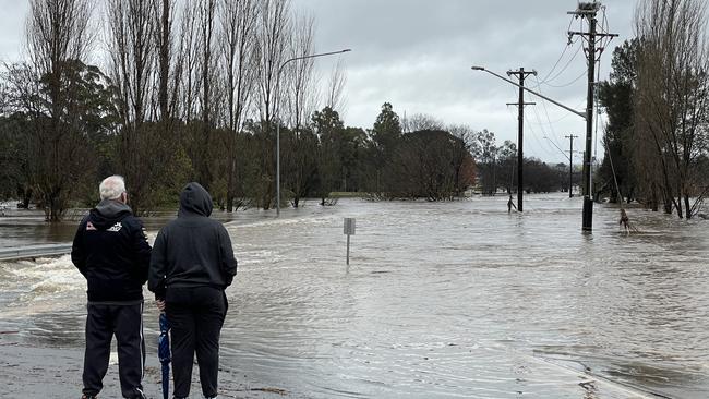 Camden Valley Way, an entry road into Camden, was completely flooded on Monday. Picture: Ashleigh Tullis