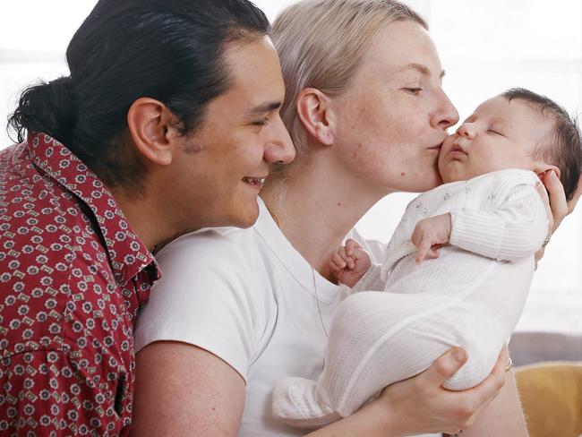 Miguel Hernandez and wife Karley Paine with their four week old daughter Gigi at Elizabeth Bay, Sydney. Picture: Sam Ruttyn