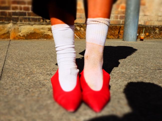 (L): Uniqlo sock. (R): Old Bonds sock with stain. Picture: news.com.au/James Weir