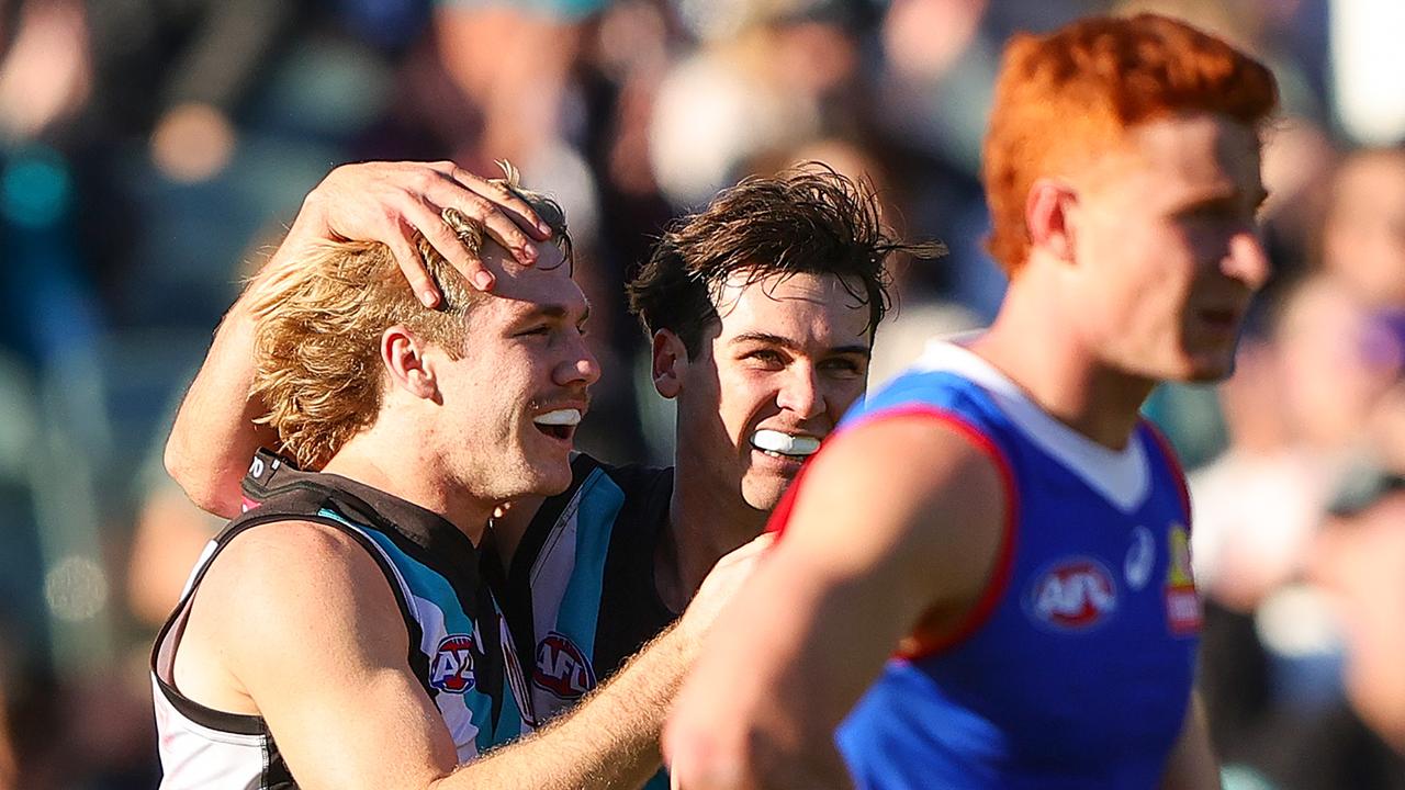 ADELAIDE, AUSTRALIA - JULY 06: Jason Horne-Francis of the Power celebrates a goal with Connor Rozee during the 2024 AFL Round 17 match between the Port Adelaide Power and the Western Bulldogs at Adelaide Oval on July 05, 2024 in Adelaide, Australia. (Photo by Sarah Reed/AFL Photos via Getty Images)