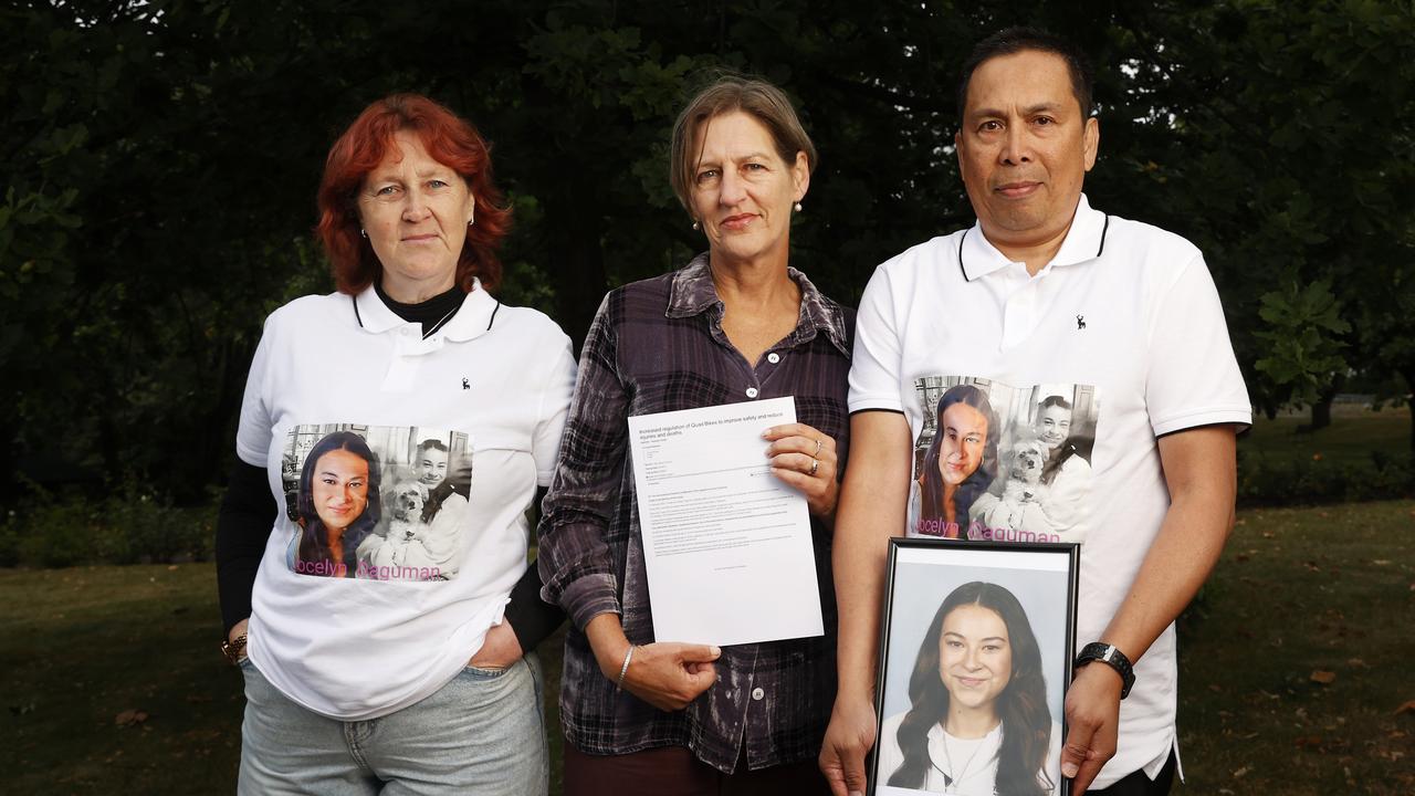 Cassy O'Connor Greens member for Hobart holding the petition with Sonia van den Heuvel and Julius Daguman parents of Jocelyn Daguman 14 who died after being involved in a quad bike accident in 2023. Picture: Nikki Davis-Jones