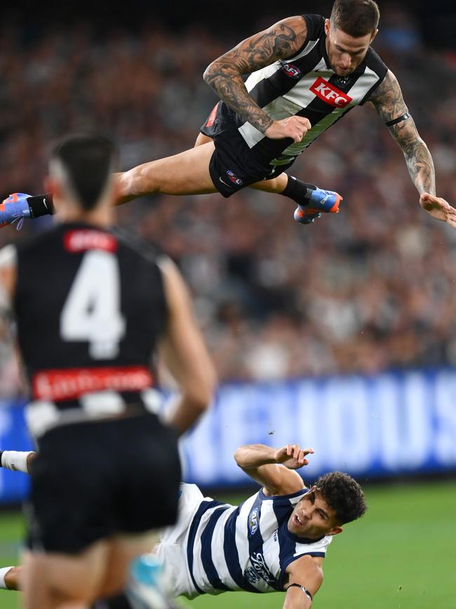 Collingwood defender Jeremy Howe flies through the air. Picture: Quinn Rooney/Getty Images