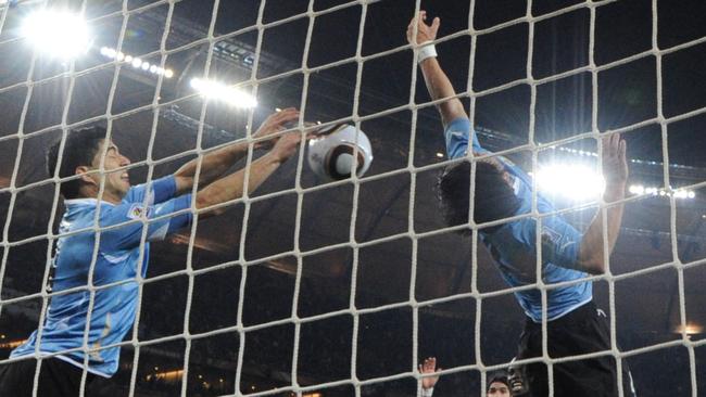 Luis Suarez’s infamous handball denied Ghana in the 2010 World Cup. Picture: AFP