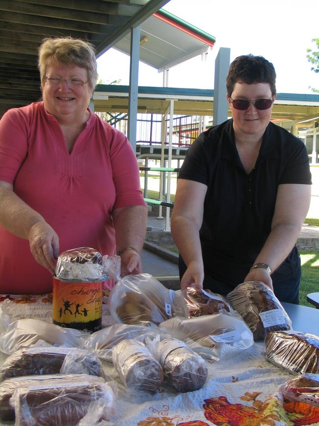 But there were more than just snags on offer. Volunteers like Jean and Heather Jones raised hundreds with cake stalls. Photo Erica Murree / Central & North Burnett Times