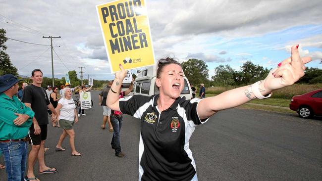 OPPOSITION: The Clermont community protests against the Bob Brown-led Anti Adani Convoy on Herschel St near the showgrounds on April 27. Picture: Steve Pohlner/AAP