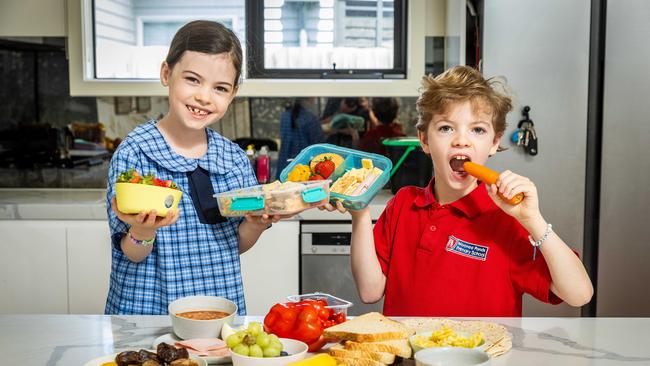 Dot, 7, and Crosby, 9, with their school lunches. Picture: Jake Nowakowski