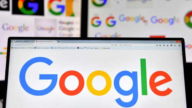 (FILES) A file photo taken on November 20, 2017 shows logos of US multinational technology company Google displayed on computers' screens. - Google is dropping out of the bidding for a huge Pentagon cloud computing contract that could be worth up to $10 billion, saying the deal would be inconsistent with its principles. The decision by Google, confirmed to AFP in an email October 9, 2018, leaves a handful of other tech giants including Amazon in the running for the Joint Enterprise Defense Infrastructure (JEDI) contract aimed at modernizing the military's computing systems. (Photo by LOIC VENANCE / AFP)