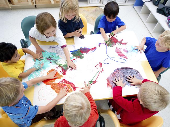 Childcare: Finger painting and communal poo buckets.