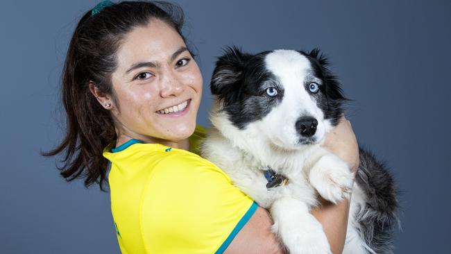 Gymnast Georgia Godwin with another of her collies, Chilli. Picture: Renae Droop