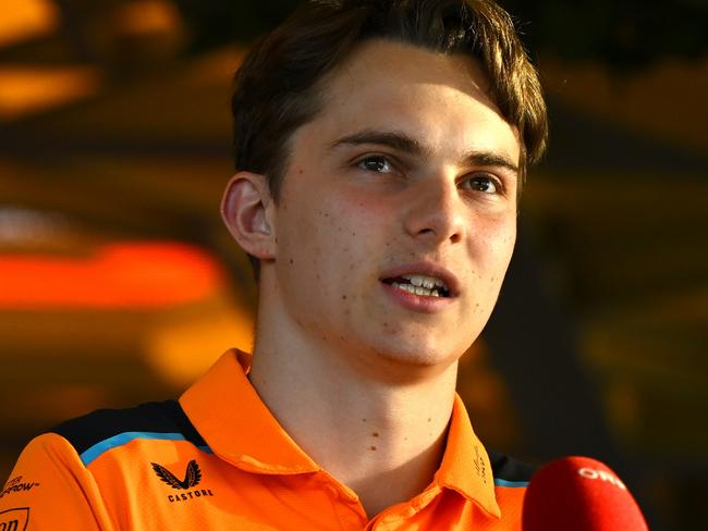 JEDDAH, SAUDI ARABIA - MARCH 16: Oscar Piastri of Australia and McLaren talks to the media in the Paddock during previews ahead of the F1 Grand Prix of Saudi Arabia at Jeddah Corniche Circuit on March 16, 2023 in Jeddah, Saudi Arabia. (Photo by Clive Mason/Getty Images)