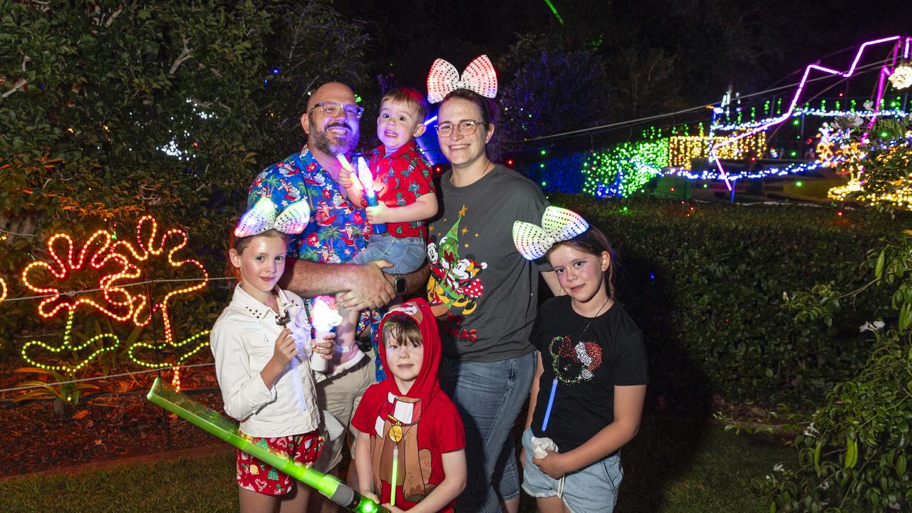 At Toowoomba's Christmas Wonderland are (from left) Adeline Martin, Peter Nicholls holding Harry Nicholls, Windsor Martin, Karleigh Nicholls and Ava Nicholls in Queens Park, Saturday, December 7, 2024. Picture: Kevin Farmer