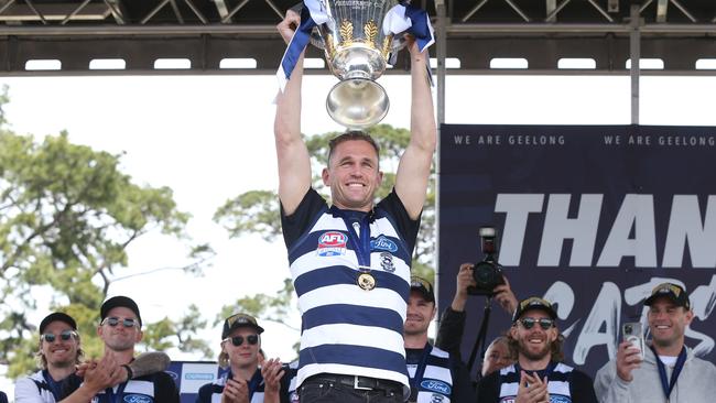 Captain Joel Selwood shows the adoring Cats fans the premiership cup. Picture: Mike Dugdale