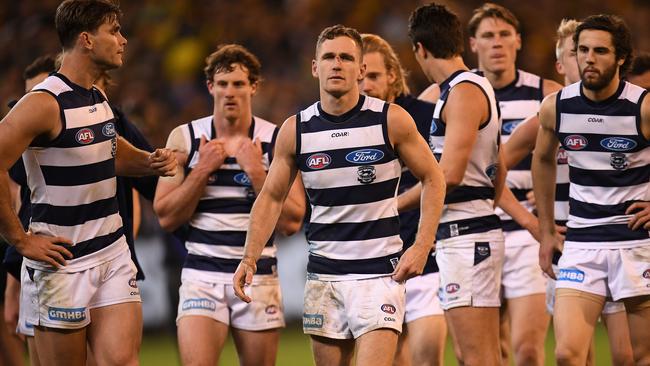 Joel Selwood leads Geelong off after the qualifying final loss to Richmond.