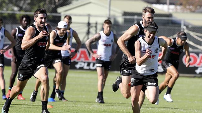 Zak Butters (leading) will make his debut for Port Adelaide against Melbourne. Picture: Sarah Reed. 