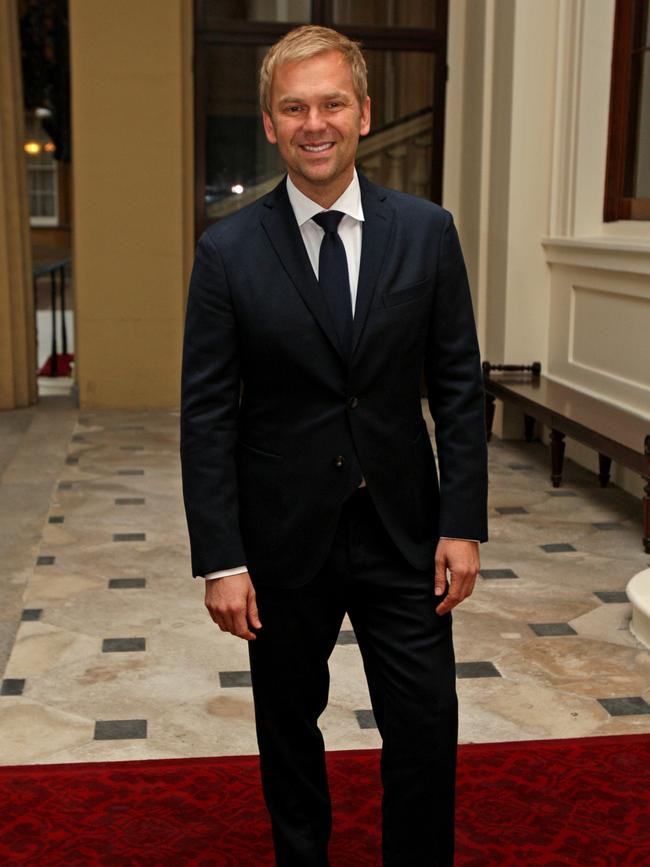 Bill Granger arrives for a reception with Queen Elizabeth II in 2011. Picture: Getty Images.