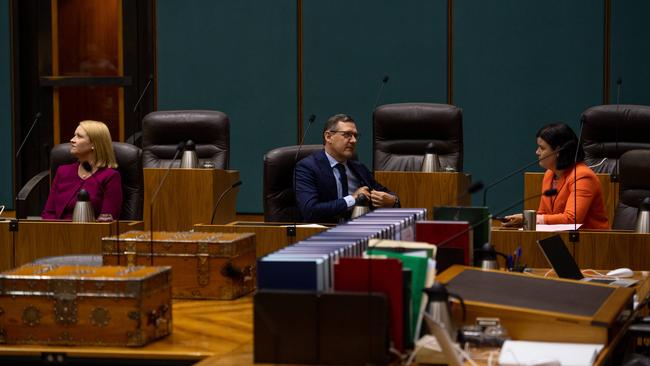 Nicole Manison, Chief Minister Michael Gunner and Natasha Fyles take their seats on the first sitting day of parliament in 2021. Photograph: Che Chorley