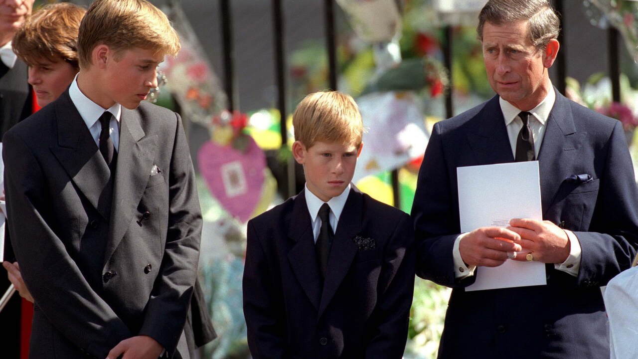 The Prince of Wales with Prince William and Prince Harry interact with the public after Diana's funeral. Picture: Getty.