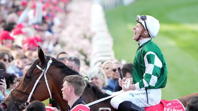 James McDonald returns triumphant after scoring the Cox Plate on Via Sistina. Picture: Racing Photos via Getty Images.