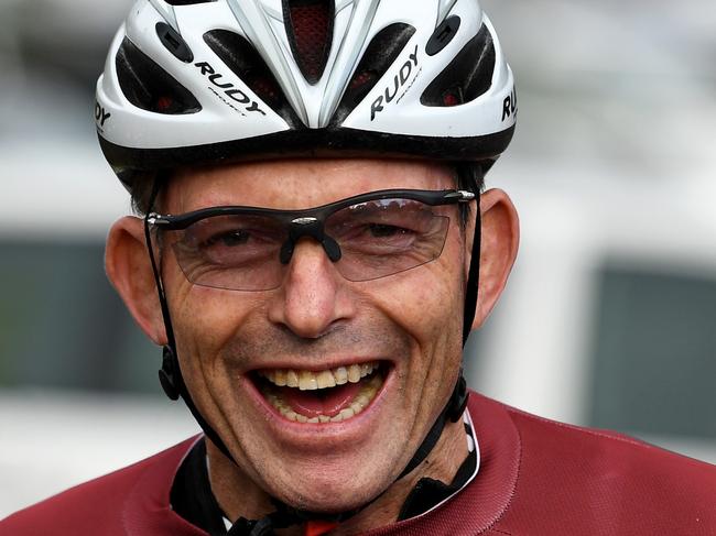 Former prime minister Tony Abbott is seen during the Pollie Pedal Bike Ride in Warragul, Victoria, Monday, April 9, 2018. Tony Abbott is sharing his words of wisdom as his coalition successor racks up the 30th Newspoll loss for the federal government. As Malcolm Turnbull matched the test he set when he deposed Mr Abbott, the former prime minister again urged the government to champion low power prices, by keeping coal, and higher wages, by cutting immigration. (AAP Image/Joe Castro) NO ARCHIVING