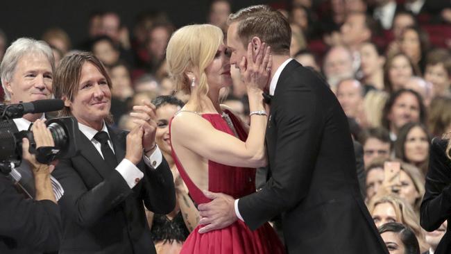 Skarsgard embraces co star Kidman after winning an Emmy. Picture: Alex Berliner/Invision for the Television Academy/AP Images `