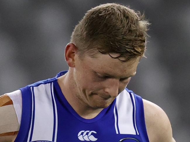 MELBOURNE, AUSTRALIA - AUGUST 14: Jack Ziebell of the Kangaroos looks dejected after a loss during the 2021 AFL Round 22 match between the North Melbourne Kangaroos and the Sydney Swans at Marvel Stadium on August 14, 2021 in Melbourne, Australia. (Photo by Michael Willson/AFL Photos via Getty Images)