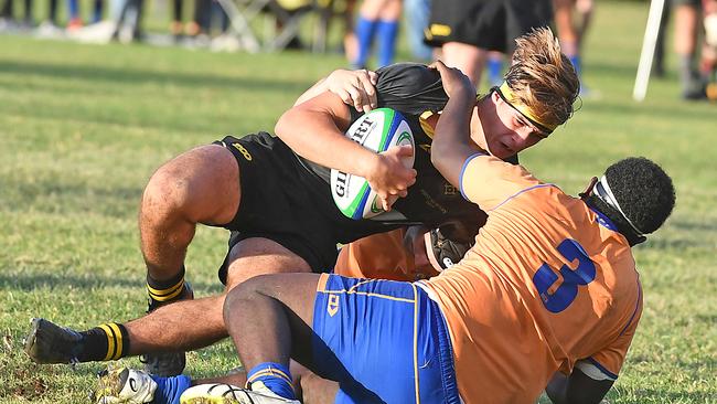 Laurence's College player John Bryant is tackled last season. (AAP image, John Gass)