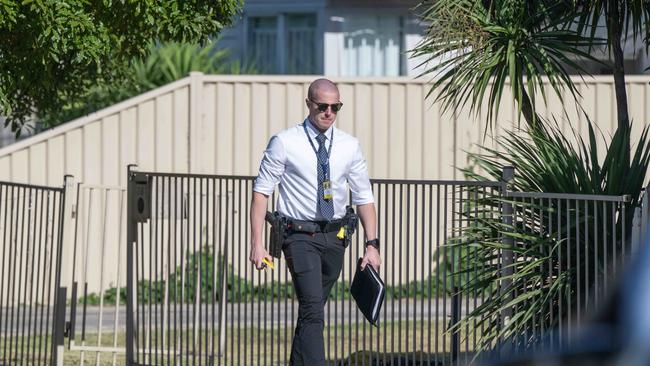 Police detectives and forensics investigate a  house shooting in Burnewang street, Albion this morning. Picture: Tony Gough