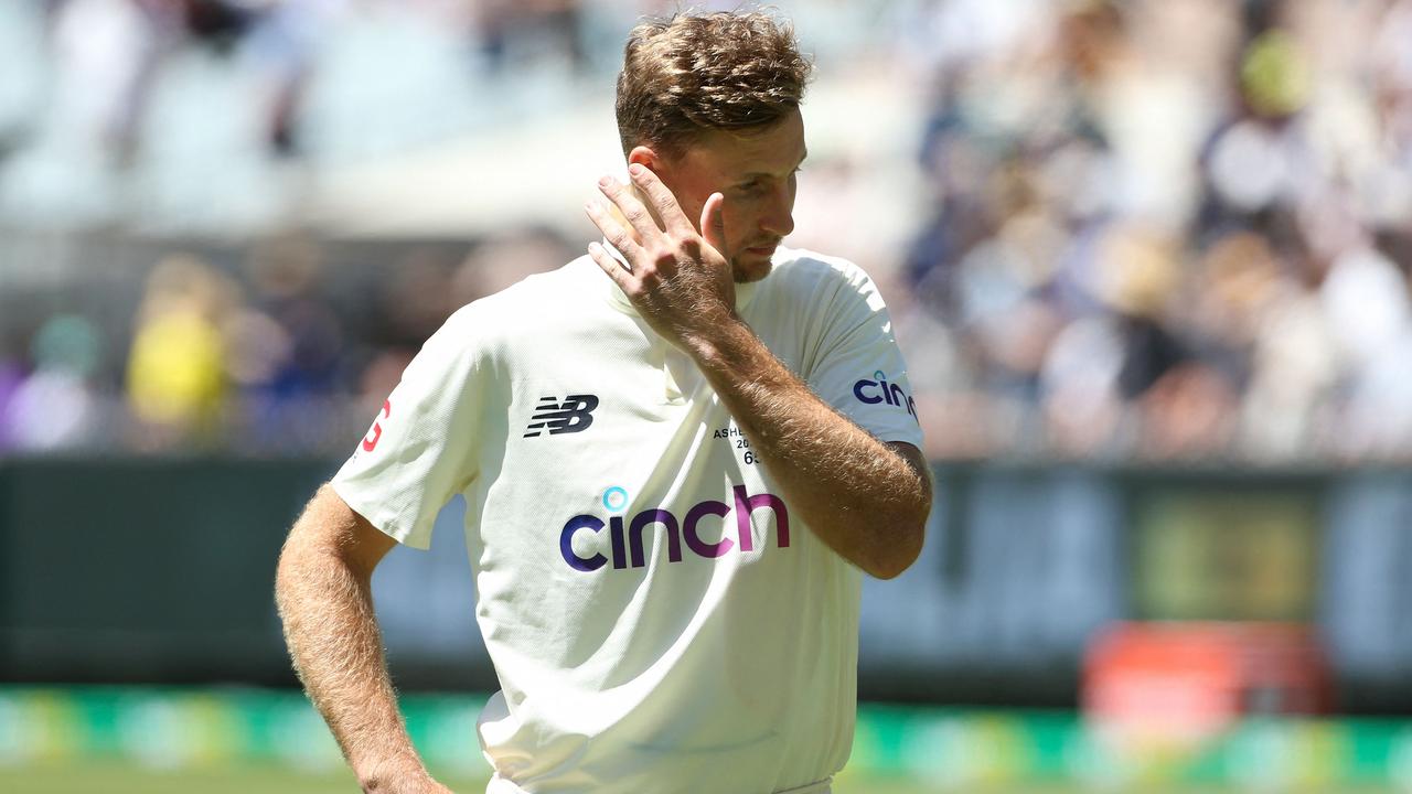 Joe Root will want to get out of Australia as soon as possible. (Photo by Hamish Blair / AFP)