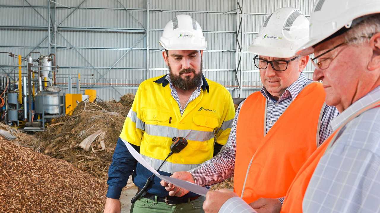 TECH -SAVVY: Southern Oil general manager Ben Tabulo, Assistant Minister to the Deputy Prime Minister Keith Pitt and Member for Flynn Ken O'Dowd look at the plans for the Australian-first hydrogen fuel cell which is expected to arrive at the Yarwun site in November. Picture: Mike Richards GLA160718NOIL