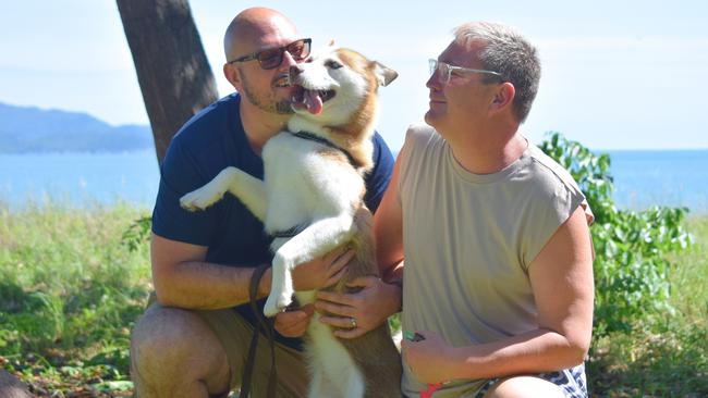 Regional NSW couple Daniel Loader and Martin Geyer were reunited with stolen dog Nova after a 22 hour journey to Townsville. Picture: Holly Fishlock.