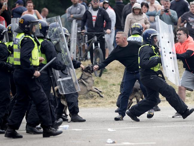 Riot cops clash with protesters outside the Holiday Inn Express in Manvers. Picture: Getty Images