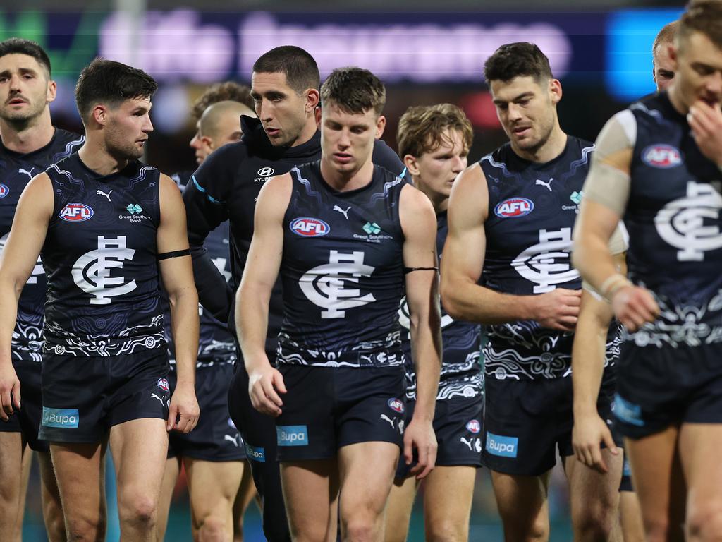 SYDNEY, AUSTRALIA - MAY 17: Blues players look dejected as they walk from the field after defeat during the round 10 AFL match between Sydney Swans and Carlton Blues at SCG, on May 17, 2024, in Sydney, Australia. (Photo by Mark Metcalfe/AFL Photos/via Getty Images)