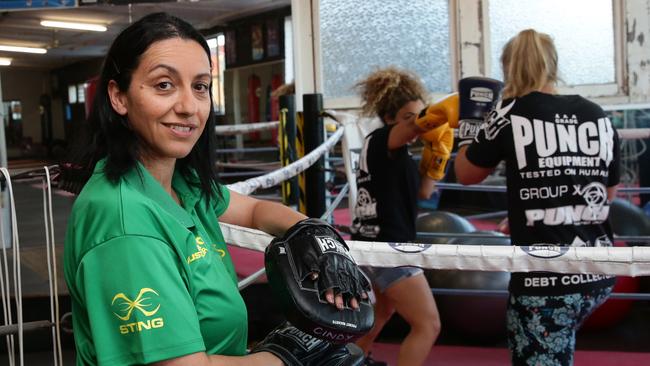 Trainer Cindy Boniface watches as Rachel Taliana and Laura Majewski spar in the ring. Picture: AAP Image/Craig Wilson.