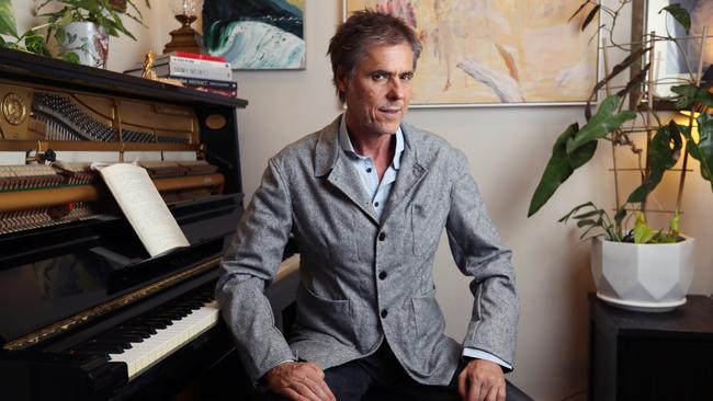 Tim Freedman at his home piano in Newtown, Sydney. Picture John Feder