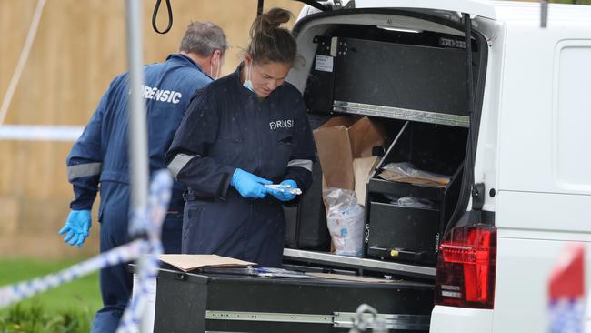 Forensic police at the scene of a fatal shooting in Donnybrook. Picture: David Crosling