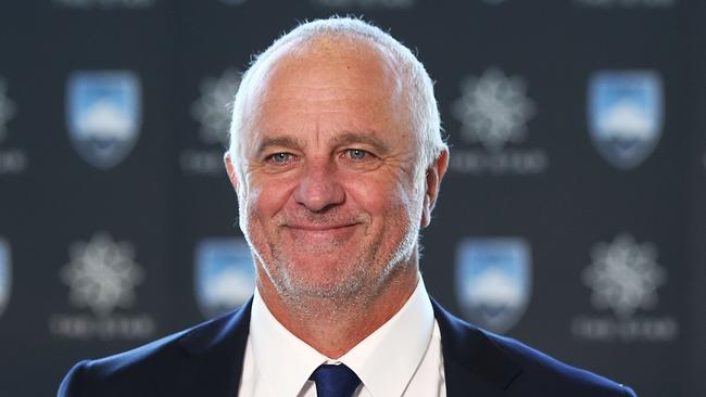 Sydney FC coach Graham Arnold says he is happy to cop flak from Western Sydney Wanderers fans.