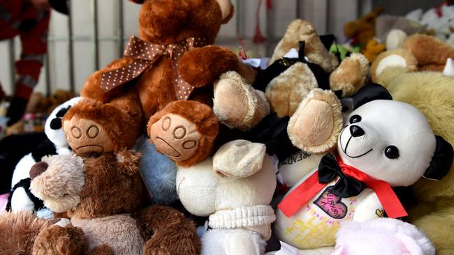 Toys, photos and written messages were collected and will be preserved, with plans for a permanent memorial considered, Melbourne Council says. Picture: Nicole Garmston