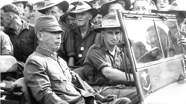 General Adachi, Commander of the Japanese troops in New Guinea, is driven to the surrender ceremony at Wewak, New Guinea, on September 13, 1945.