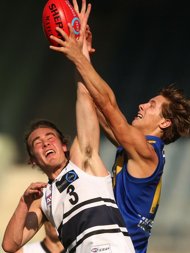 Lachlan Fogarty (right) competes for a ball in the air. Picture: Getty