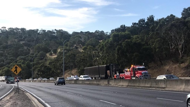 A truck caught fire on the freeway uptrack, causing considerable delays. Picture: Dixie Sulda.