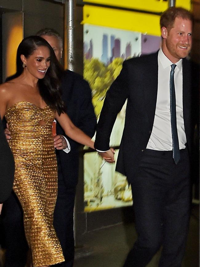 Prince Harry and Meghan Markle not posing for photos, which they’ve demanded from the paparazzi agency. Picture: MEGA/GC Images