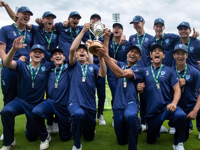 NSW Metro players with the spoils of victory after winning the under-17 national championships final against Queensland on Thursday. Picture: Linda Higginson/Cricket Australia (EDITORIAL USE ONLY)