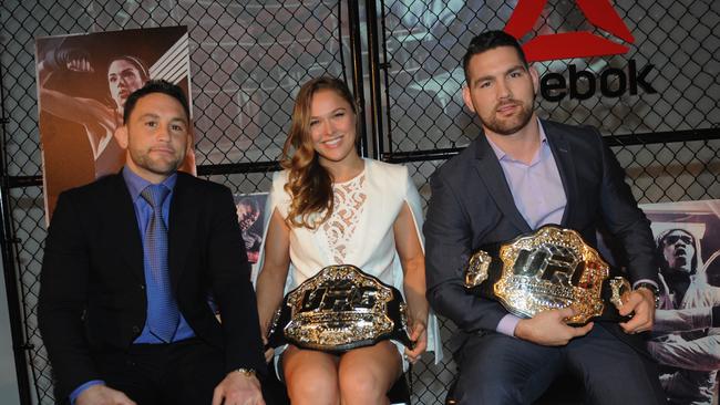 Frankie Edgar, Ronda Rousey and Chris Weidman appear at the announcement of the UFC Reebok partnership.