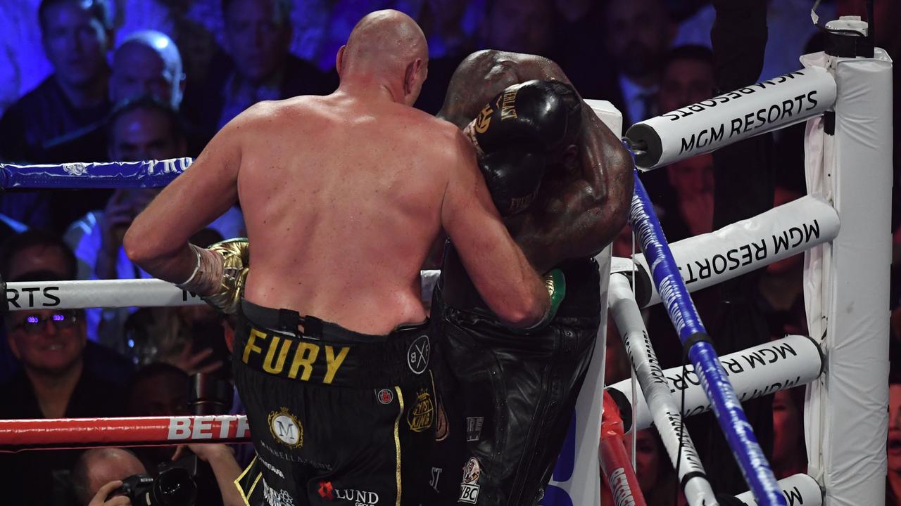 This was the moment the towel was thrown in by Deontay Wilder's trainer to secure British boxer Tyson Fury the WBC Heavyweight Championship title. Picture: Mark Ralston