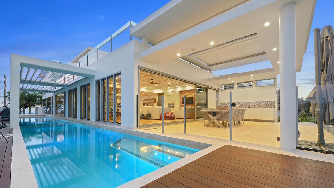 Listed for sale, this Kings Beach residence has some serious wow factor. The four-storey home features ocean views, and boasts the ultimate adults’ backyard featuring a lap pool with 25 viewing portholes, a rooftop putting green, a fully equipped bar, an outdoor pizza oven, a gym and a steam room.