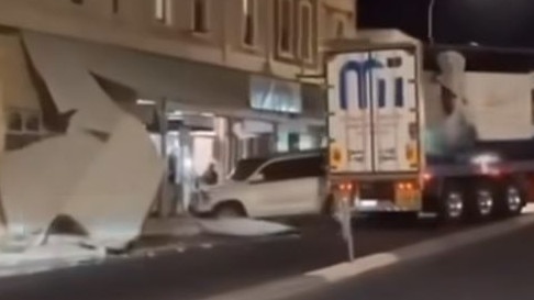 A truck has been captured scraping into a building and two parked cars in the main street of Gawler late on Friday night. Picture: Facebook/Drillin’ Panagiotou