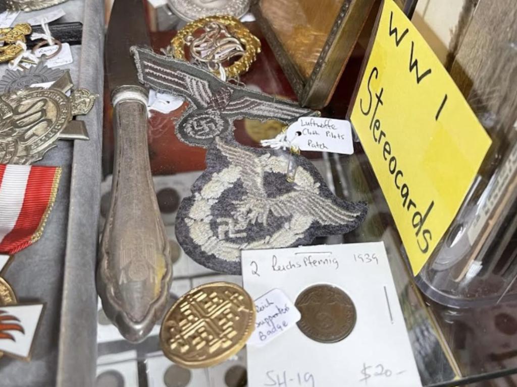 Calls have intensified for the government to ban retailers from selling Nazi memorabilia after the grandson of a Holocaust survivor encountered two “perverse” items on display in a NSW store.